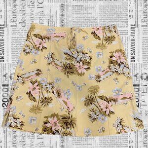 Vintage beachy yellow mini skirt with palm trees and floral design